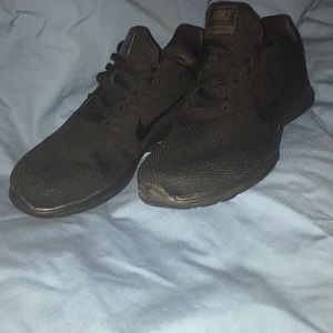 Black Womans Nike tennis shoes